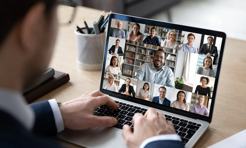 Man having an online meeting with his partners